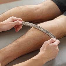 Photo of IASTM treatment of leg